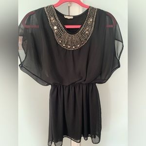 Beautiful black dress with sequence on the neckline